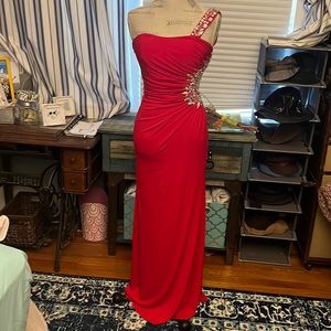 Absolutely stunning sexy gown. Worn only once. In perfect condition